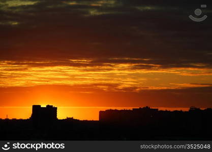 city sunrise close up yellow sky