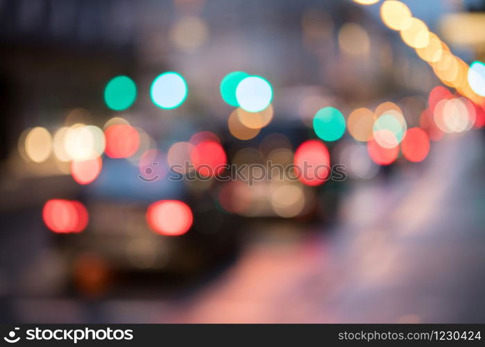 City traffic in the night, blurred with light points