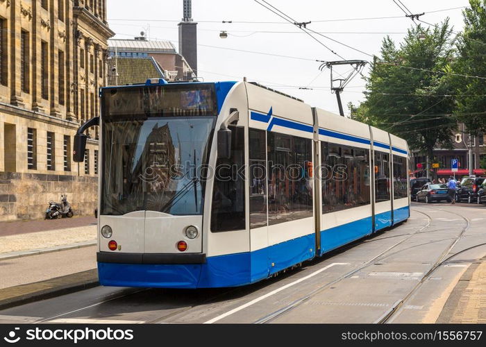 City tram in Amsterdam in a beautiful summer day, The Netherlands