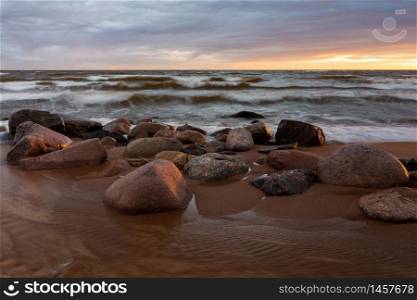 City Tuja, Latvia. Baltic sea with rocks and sand. Travel photo.16.05.2020