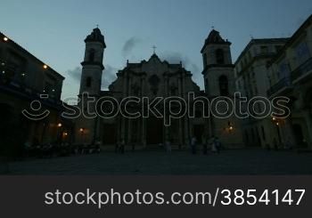 City view of Havana, Cuba. The cathedral and square at dusk in Habana Vieja. Time-lapse