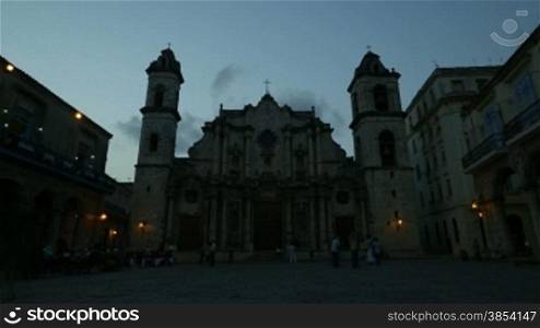 City view of Havana, Cuba. The cathedral and square at dusk in Habana Vieja. Time-lapse