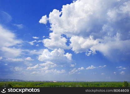 City view with blue cloudy sky