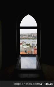 City viewed through an arched window of a building, Istanbul, Turkey