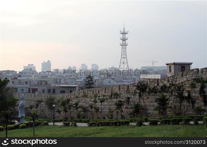 City wall and buildings in Chongwu, China