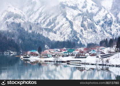 City with winter landscape along Tadami River in Fukushima Japan