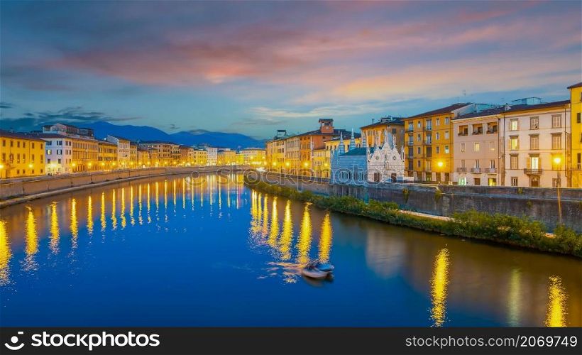 Citydscape with Pisa old town and Arno river in Tuscany, Italy