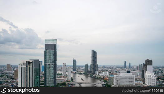 Cityscape and high-rise buildings in metropolis city center . Downtown business district in panoramic view .. Cityscape and high-rise buildings in metropolis city center