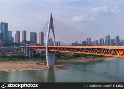 Cityscape and skyline of downtown near Chongqing Dongshuimen Bridge and Yangtze river. Chongqing, China.