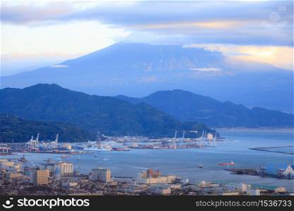 Cityscape and transport port of Shimizu bay with top of mount Fuji view background from Nihondaira at Shizuoka prefecture at morning in Japan