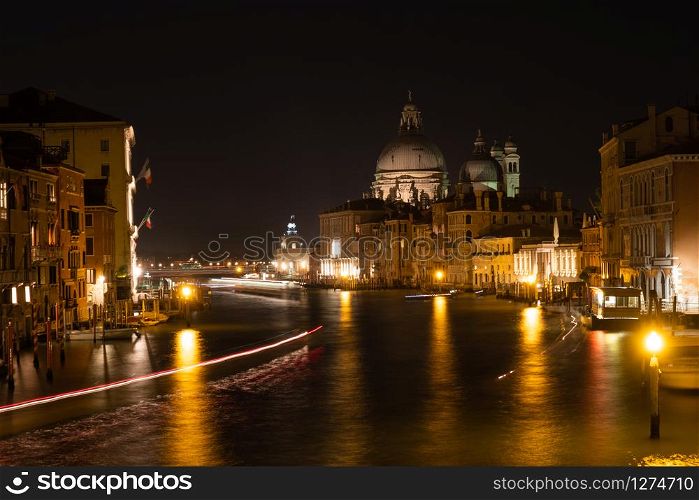 Cityscape image of Grand Canal with Santa Maria della Salute Basilica on the background, Venice, Italy. Cityscape image of Grand Canal with Santa Maria della Salute Basilica