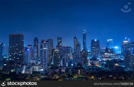 Cityscape night panorama view of Bangkok modern office business building and high skyscraper in business district at Bangkok,Thailand.