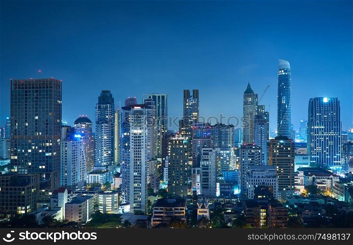 Cityscape night view of Bangkok modern office business building and high skyscraper in business district at Bangkok,Thailand.