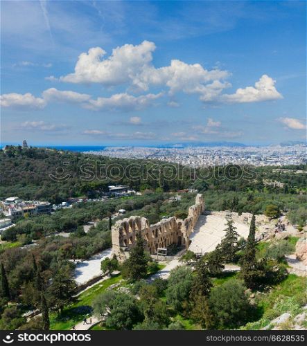 cityscape of Athens of Herodes Atticus amphitheater of Acropolis and blue sky with clouds, Athens, Greece. Herodes Atticus amphitheater of Acropolis, Athens