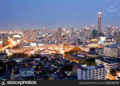 Cityscape of Bangkok Skylines at Victory Monument Downtown at Dusk aerial view