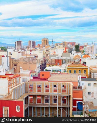 Cityscape of Cartagena, colorful houses  and mountains in backround, Spain