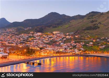 Cityscape of Madeira coast town at twilight. Madeira island, Portugal