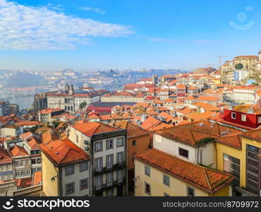 Cityscape of Porto old town rooftops in sunny day, Ribeira, Portugal
