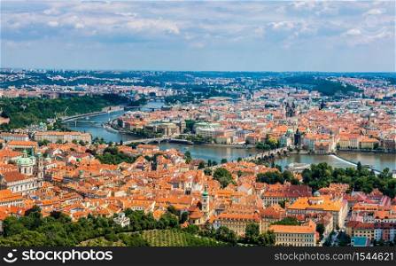 Cityscape of Prague in summer. River, bridges