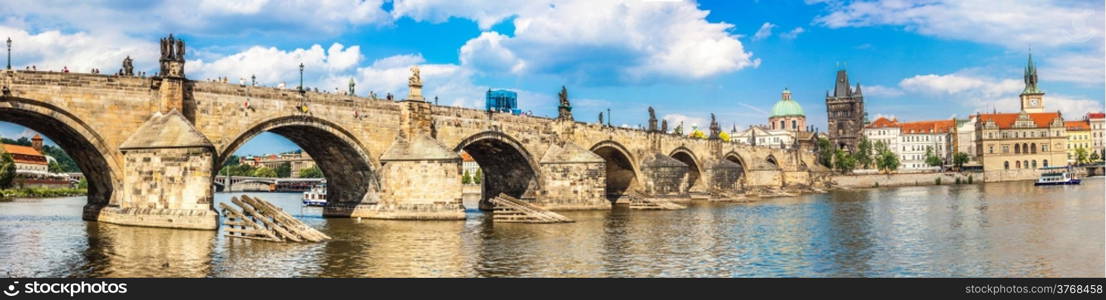 Cityscape of Prague. Panoramic view of Karlov or charles bridge and river Vltava in Prague in summer