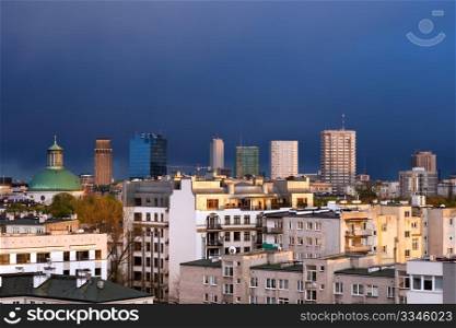 Cityscape of Warsaw, capital of Poland. Srodmiescie district, late afternoon, stormy sky.