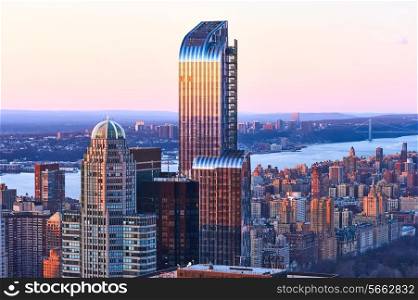Cityscape view of Manhattan, New York City, USA at sunset