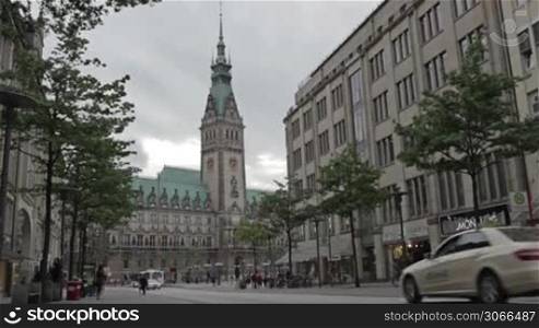 Cityscape with City hall, Rathaus. City traffic and pedestrians. City life, urban scene on June, 02, 2012 in Hamburg, Germany.