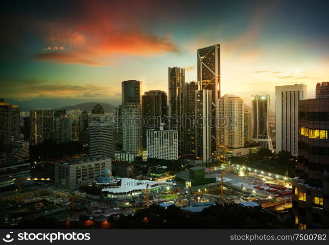 Cityscape with modern and developmental ,twilight scene ,Kuala Lumpur ,Malaysia .