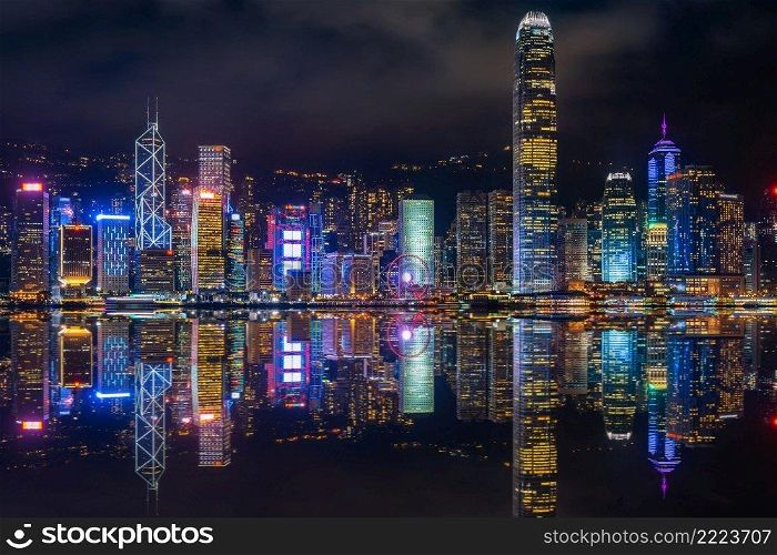 Cityscape with skyscraper at night in Hong Kong.