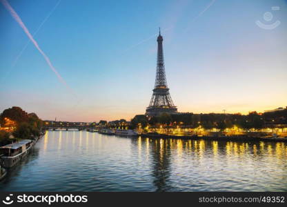 Cityscape with the Eiffel tower in Paris, France at sunrise