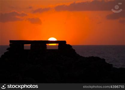 Ciutadella Menorca at Punta Nati orange sunset in Baearic Islands
