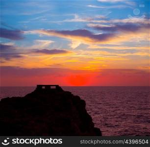 Ciutadella Menorca at Punta Nati orange sunset in Balearic Islands
