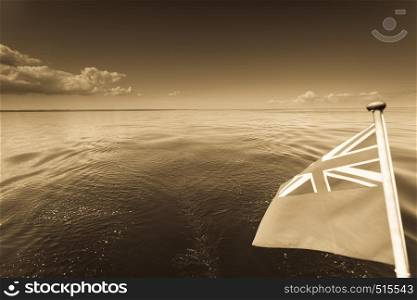 Civil banner United Kingdom flag on sailing boat yacht in front bow.. Civil banner United Kingdom flag on sailing boat