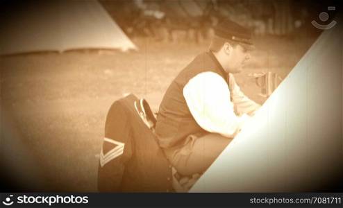 Civil War soldier chatting near tent in camp (Archive Footage Version)