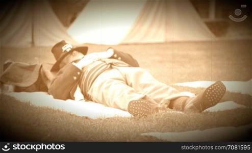 Civil War soldier napping in camp (Archive Footage Version)