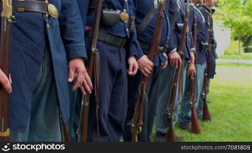 Civil War soldiers at attention and turn
