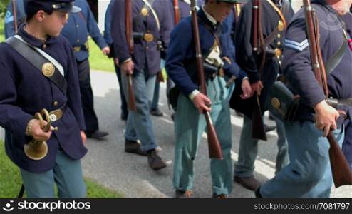 Civil War soldiers begin slowly marching