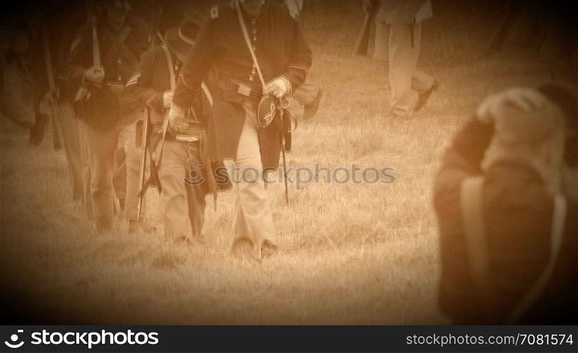Civil War soldiers marching across field (Archive Footage Version)