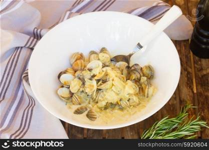Clam shells. Clam shell fish in big white plate