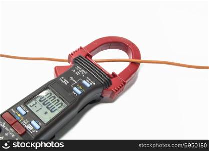 Clamp meter checking electric cable
