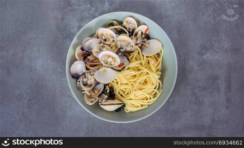 Clams pasta seafood dish. Clams pasta In White Wine Butter Sauce on dish