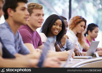 Class Of University Students Using Laptops In Lecture