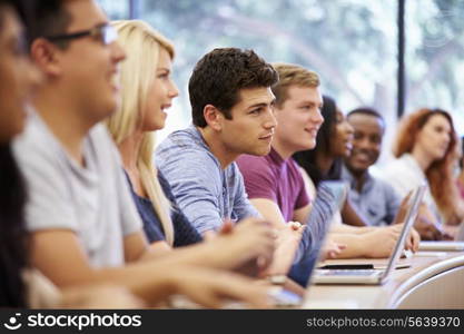 Class Of University Students Using Laptops In Lecture