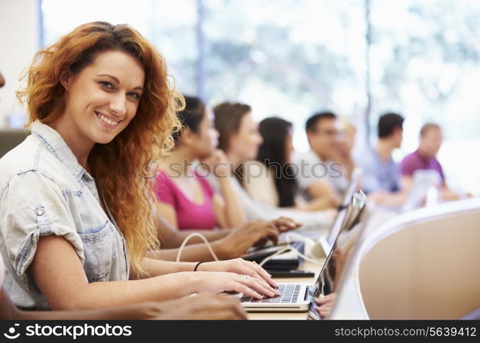 Class Of University Students Using Laptops In Lecture