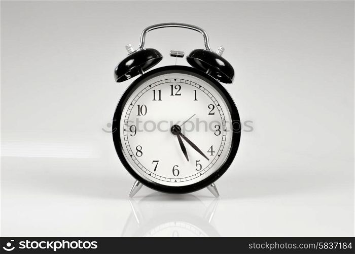 Classic alarm clock on a table