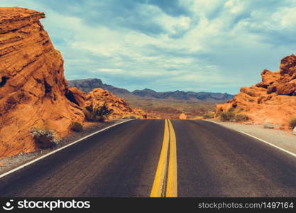 Classic american southwest road during a road trip to famous national parks - Scenic Drive, Valley of Fire State Park - United States