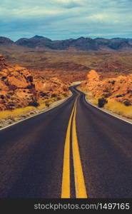 Classic american southwest road during a road trip to famous national parks - Scenic Drive, Valley of Fire State Park - United States