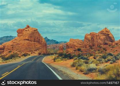 Classic american southwest road during a road trip to famous national parks - Scenic Drive, Valley of Fire State Park - United States