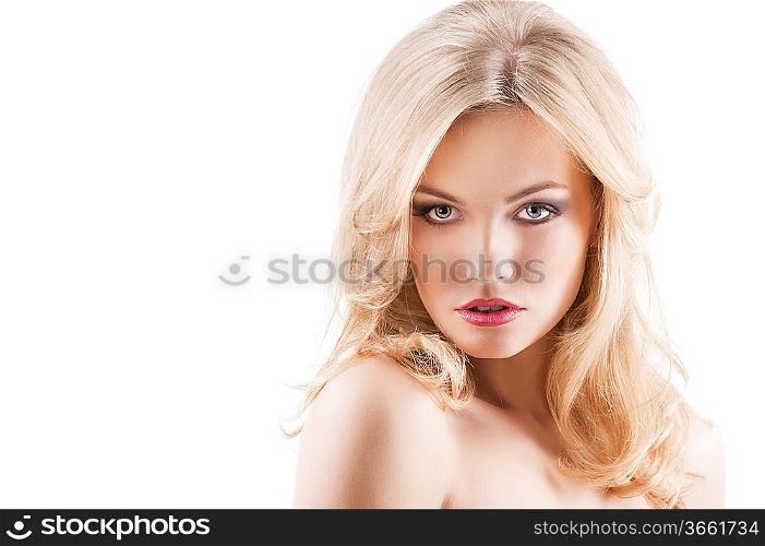 classic beauty portrait of young sexy girl with hairstyle and flying hair from wind, she is in front of the camera and looks in to the lens with mouth sligtly open