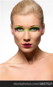 classic beauty shot of young beautiful woman with color creative make up
